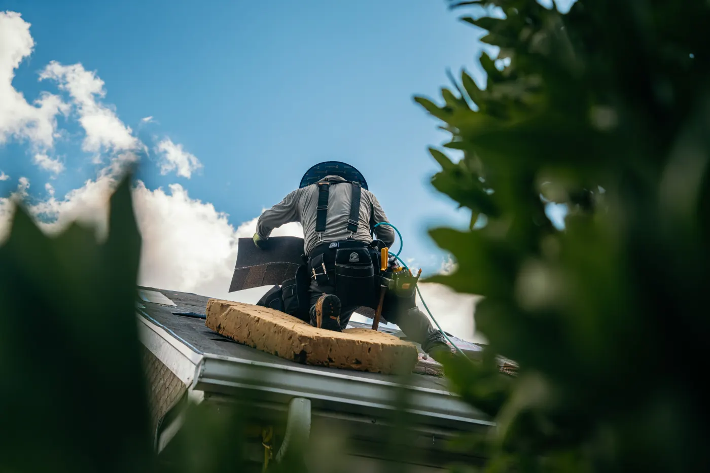 Emergency tarping on a Jackson's Grant roof
